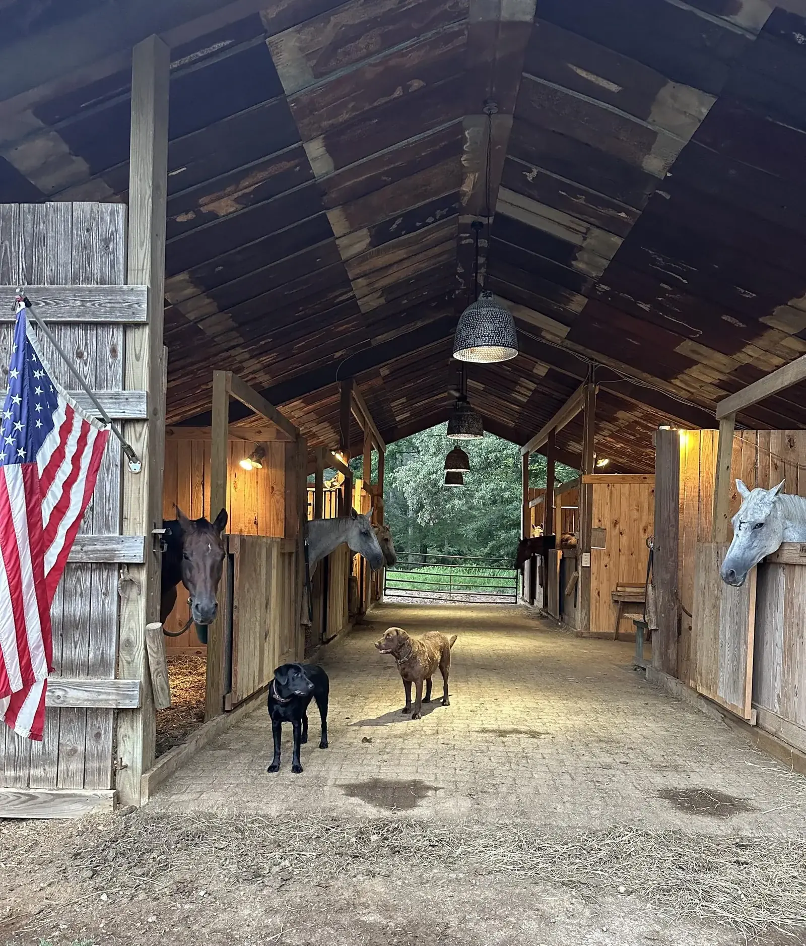 Looking down the aisle of the open cypress barn