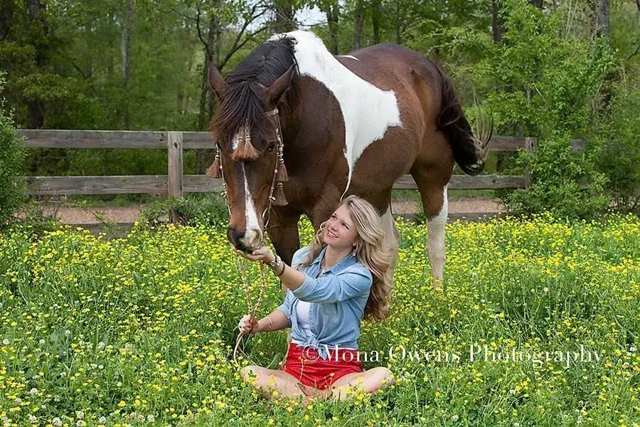 Ellery and Comanche in the buttercups.