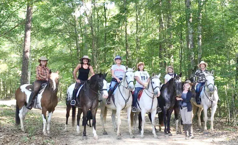 A hosted trail ride setting out.